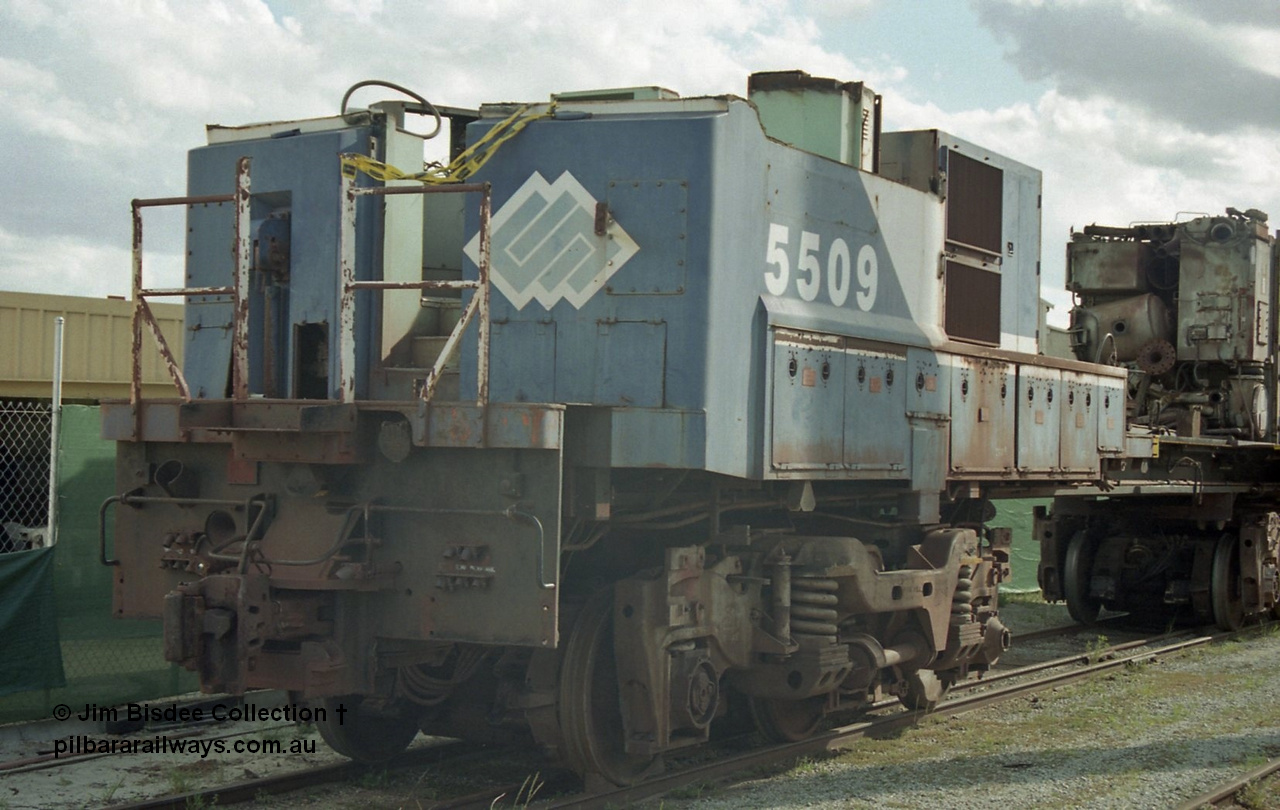 19798
Bassendean, Goninan workshops, former BHP Iron Ore Goninan GE rebuild C36-7M unit 5509, seen here stripped down to being an engine test bed, close up of front pilot. Sept 2003.
Jim Bisdee photo.
Keywords: 5509;Goninan;GE;C36-7M;4839-05/87-074;rebuild;AE-Goodwin;ALCo;C636;5452;G6012-1;