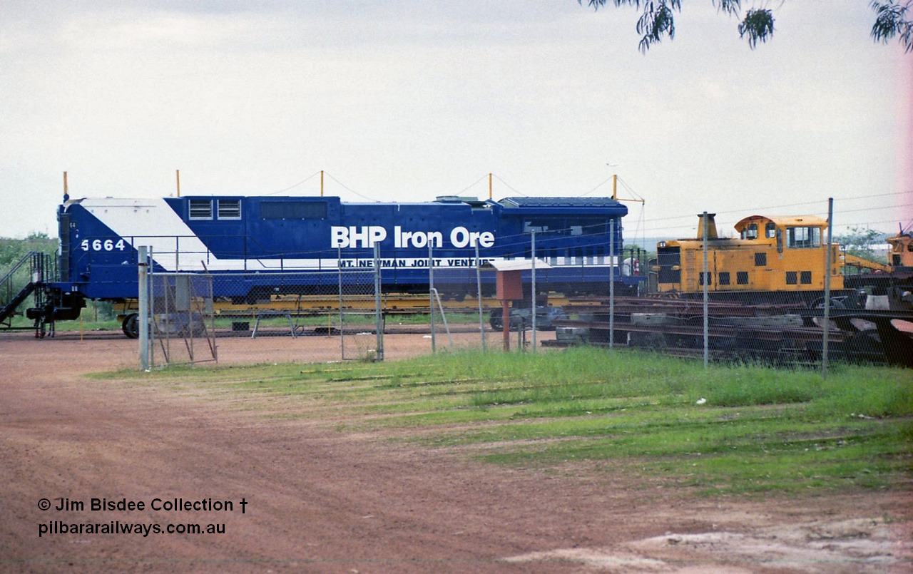 21247
Bassendean, Goninan workshops, sitting on shop bogies out the back, BHP Iron Ore Goninan GE CM40-8ML - L for LocoTrol - rebuild unit 5664 serial 8412-09 / 94-155 was rebuilt without a cab and fitted with LocoTrol II from AE Goodwin ALCo M636 5469 serial G6047-1. September 1994.
Jim Bisdee photo.
Keywords: 5664;Goninan;GE;CM40-8ML;8412-09/94-155;rebuild;AE-Goodwin;ALCo;M636C;5469;G6047-1;