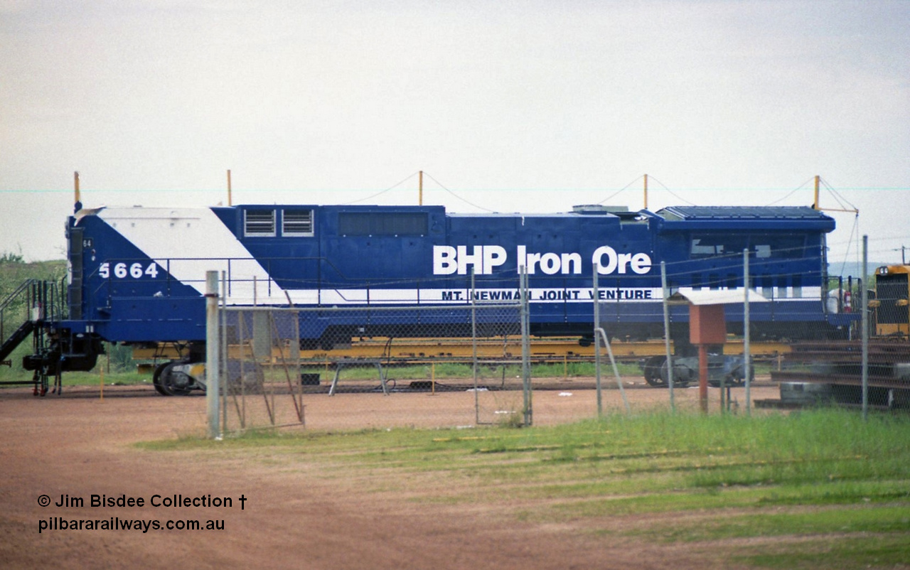 21248
Bassendean, Goninan workshops, sitting on shop bogies out the back, BHP Iron Ore Goninan GE CM40-8ML - L for LocoTrol - rebuild unit 5664 serial 8412-09 / 94-155 was rebuilt without a cab and fitted with LocoTrol II from AE Goodwin ALCo M636 5469 serial G6047-1. September 1994.
Jim Bisdee photo.
Keywords: 5664;Goninan;GE;CM40-8ML;8412-09/94-155;rebuild;AE-Goodwin;ALCo;M636C;5469;G6047-1;