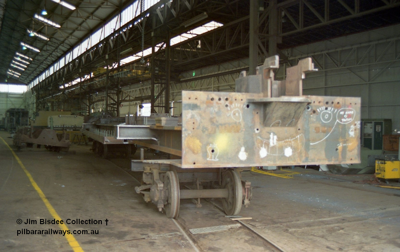 22651
Bassendean, during an Open Day at the Goninan workshops, an up turned ALCo frame is in the process of being converted to a GE CM40-8M. 20th July 1991.
Jim Bisdee photo.
Keywords: Goninan;GE;CM40-8M;