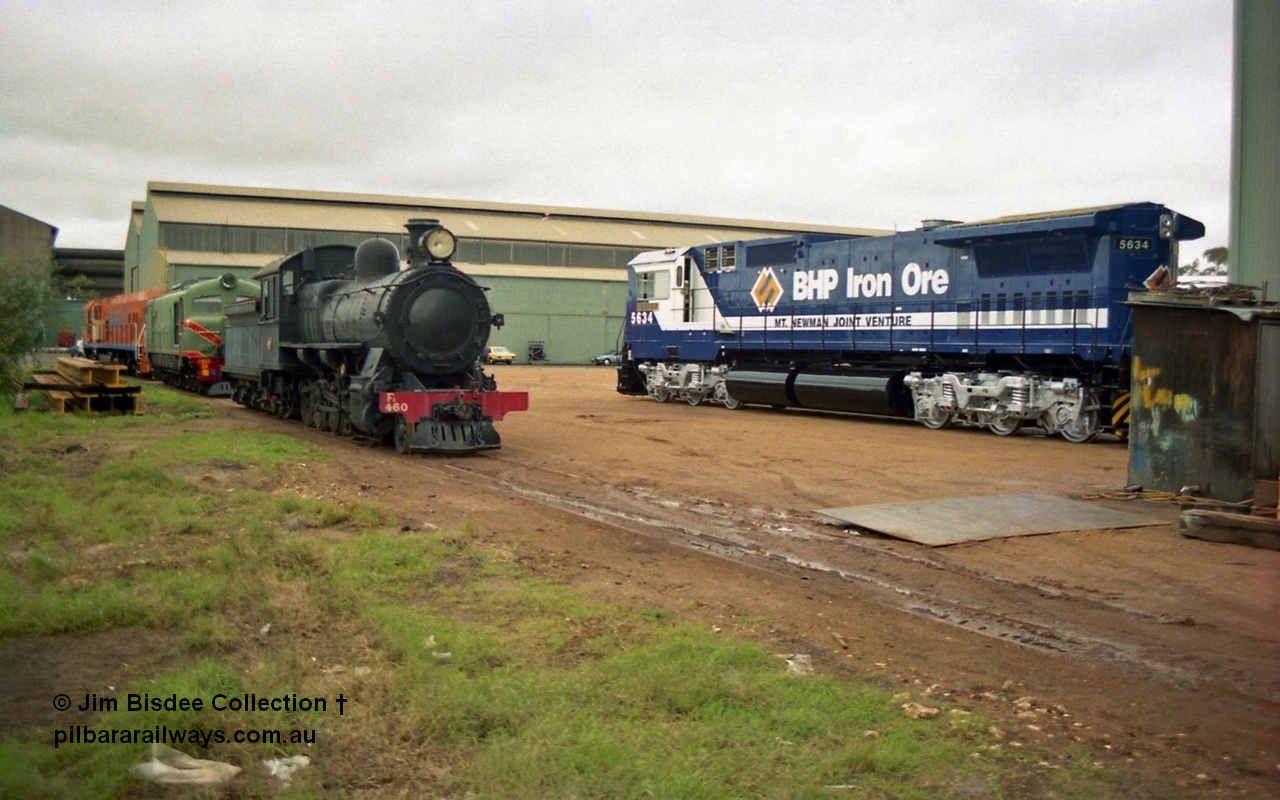 22654
Bassendean, Goninan workshops, brand new GE CM40-8M rebuild unit for BHP Iron Ore 5634 'Boodarie' serial 8151-07 / 91-120 looks to be in the final stages of construction as it sits out side during an Open Day on 20th July 1991 with WAGR Fs 460 4-8-0 steam locomotive and Xa Class No 1405 'Warienga'. 20th July 1991.
Jim Bisdee photo.
Keywords: 5634;Goninan;GE;CM40-8M;8151-07/91-120;rebuild;AE-Goodwin;ALCo;C636;5457;G6027-1;