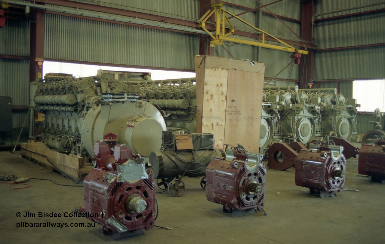 22666
Bassendean, during an Open Day at the Goninan workshops, new GE-7FDL-16 prime-movers, some with GMG187 main alternators for install into a GE CM40-8M rebuilds and some GE752 AH traction motors. 20th July 1991.
Jim Bisdee photo.
