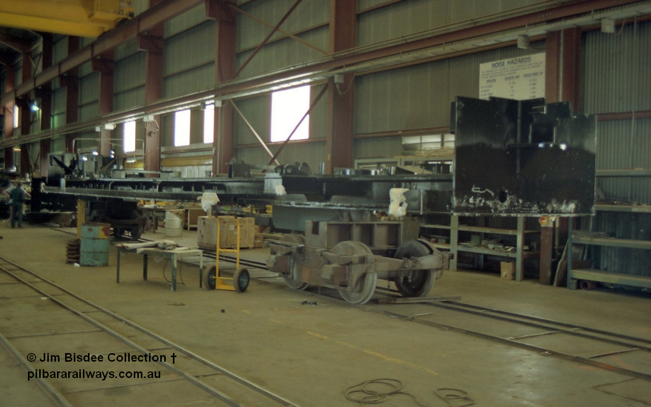 22669
Bassendean, during an Open Day at the Goninan workshops, a stripped back ALCo locomotive frame under re-construction which will become a GE CM40-8M. 20th July 1991.
Jim Bisdee photo.
Keywords: Goninan;GE;CM40-8M;