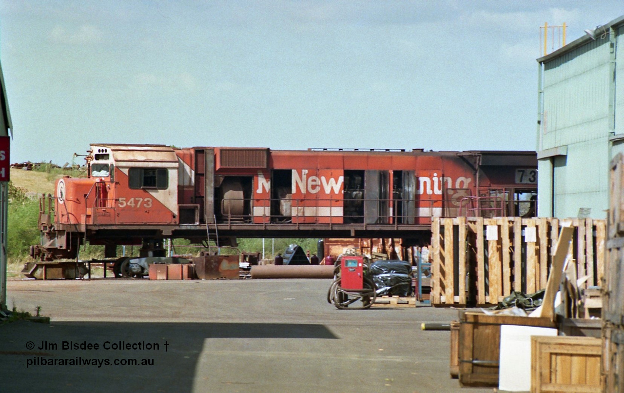 23694
Bassendean, Goninan workshops, Mt Newman Mining's AE Goodwin built ALCo model M636 unit 5473 serial G6047-5 undergoing rebuilding into a GE CM40-8M unit, 5473 would emerge rebuilt as 5649 in July 1993. December 1992.
Jim Bisdee photo.
Keywords: 5473;AE-Goodwin;ALCo;M636C;G6047-5;