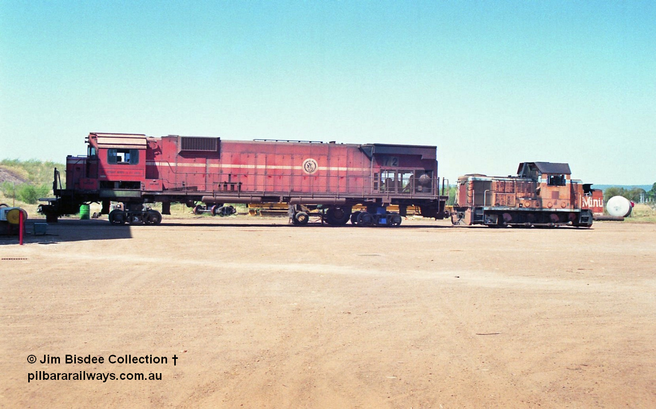 23711
Bassendean, Goninan workshops, 'on loan' the ARHS B class shunt engine is coupled to Mt Newman Mining's AE Goodwin built ALCo model M636 unit 5472 serial G6047-4 undergoing rebuilding into a GE CM40-8M unit, 5472 would emerge rebuilt as 5651 in August 1993. December 1992.
Jim Bisdee photo.
Keywords: 5472;AE-Goodwin;ALCo;M636C;G6047-4;