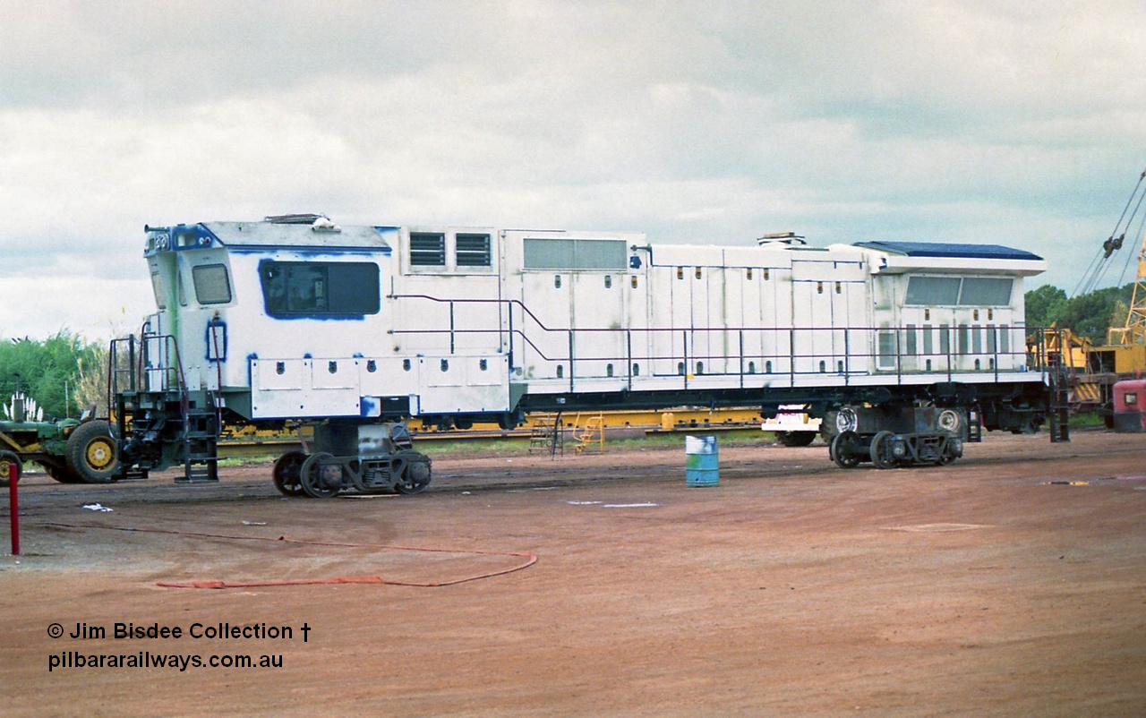 23877
Bassendean, Goninan workshops, an unidentified ALCo to GE CM40-8M rebuild unit, could be 5648. July 1993.
Jim Bisdee photo.
Keywords: Goninan;GE;CM40-8M;