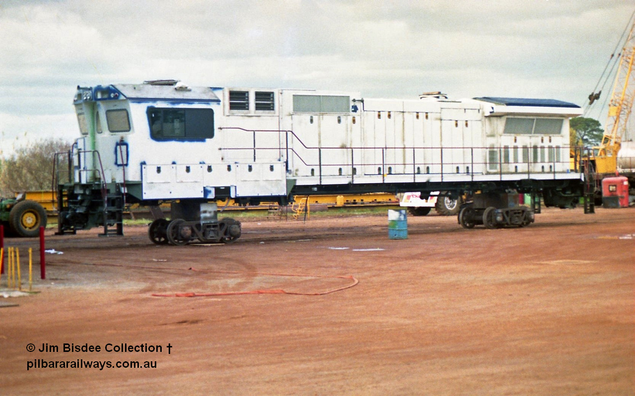 23878
Bassendean, Goninan workshops, an unidentified ALCo to GE CM40-8M rebuild unit, could be 5648. July 1993.
Jim Bisdee photo.
Keywords: Goninan;GE;CM40-8M;