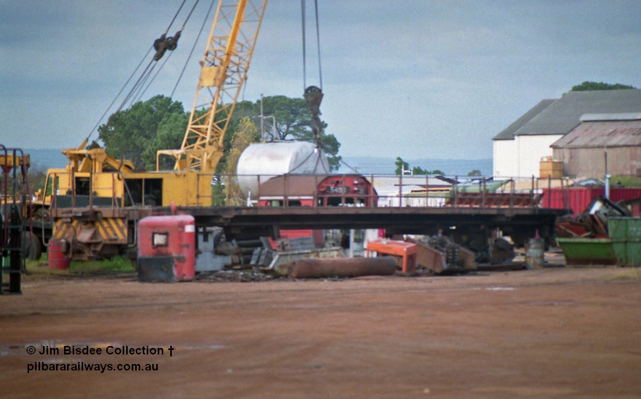 23879
Bassendean, Goninan workshops, a stripped back ALCo locomotive frame under re-construction which will become a GE CM40-8M. July 1993.
Jim Bisdee photo.
Keywords: Goninan;GE;CM40-8M;