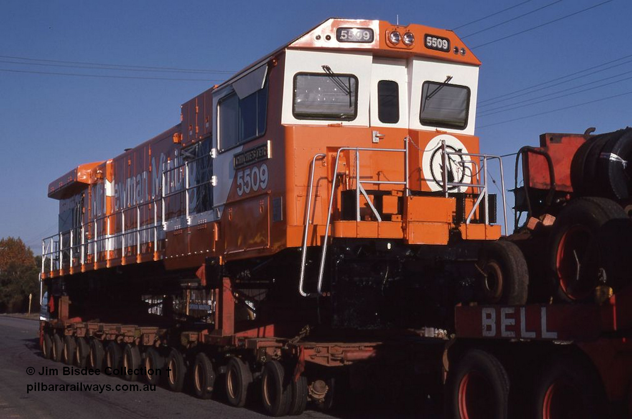 5835 001 Welshpool 1987July
Welshpool, Goninan rebuilt GE C36-7M unit 5509 'Chichester' serial 4839-05 / 87-074 rebuilt using Mt Newman Mining AE Goodwin ALCo C636 5452 serial G6012-1, on a Bell road float in July 1987.
Jim Bisdee photo.
Keywords: 5509;Goninan;GE;C36-7M;4839-05/87-074;rebuild;AE-Goodwin;ALCo;C636;5452;G6012-1;