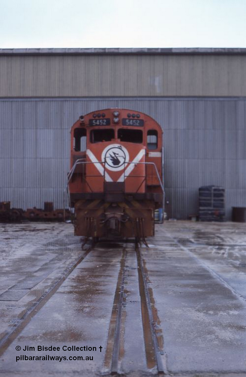 5946 001 Welshpool 1986Sept
Welshpool, Goninan workshops, Mt Newman Mining C636 ALCo unit 5452 serial G6012-1 built by AE Goodwin in May 1968 is undergoing a world first as it gets rebuilt into a GE C36-7M locomotive, by July 1987 it would become 5509. Sept 1986.
Jim Bisdee photo.
Keywords: 5452;AE-Goodwin;ALCo;C636;G6012-1;