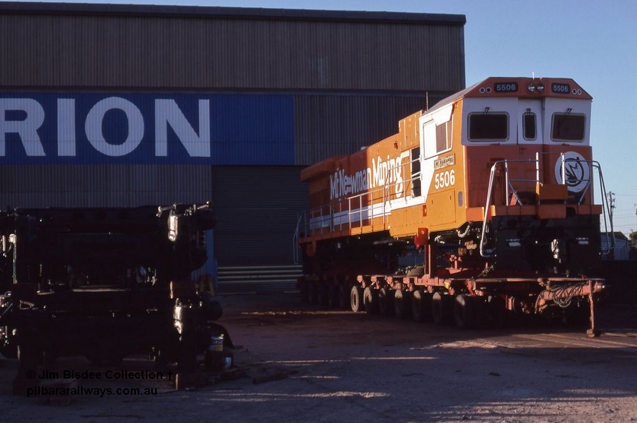 5947 001 Welshpool 1987Jan
Welshpool, Goninan workshops, freshly rebuilt and ready for delivery, Mt Newman Mining C36-7M locomotive 5506 serial 4839-01 / 87-071 sits on a road transport float awaiting delivery to Port Hedland, it was rebuilt using AE Goodwin built C636 ALCo 5455 serial G6012-4. January 1987.
Jim Bisdee photo.
Keywords: 5506;Goninan;GE;C36-7M;4839-01/87-071;rebuild;AE-Goodwin;ALCo;C636;5455;G6012-4;