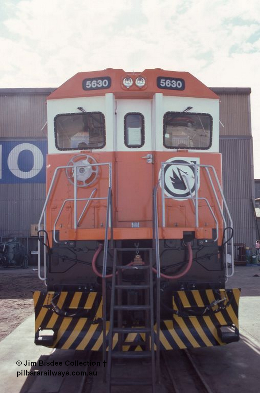 6988 001
Welshpool, Goninan Open Day 27th August, 1988. Front on view of Mt Newman Mining's Goninan new build GE CM39-8 model loco 5630 'Zeus' serial 5831-09 / 88-079.
Jim Bisdee photo.
Keywords: 5630;Goninan;GE;CM39-8;5831-09/88-079;