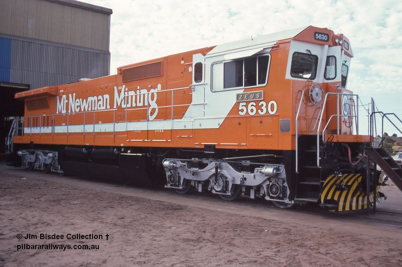 6993 001
Welshpool, Goninan Open Day 27th August, 1988. Mt Newman Mining's Goninan new build GE CM39-8 model loco 5630 'Zeus' serial 5831-09 / 88-079.
Jim Bisdee photo.
Keywords: 5630;Goninan;GE;CM39-8;5831-09/88-079;