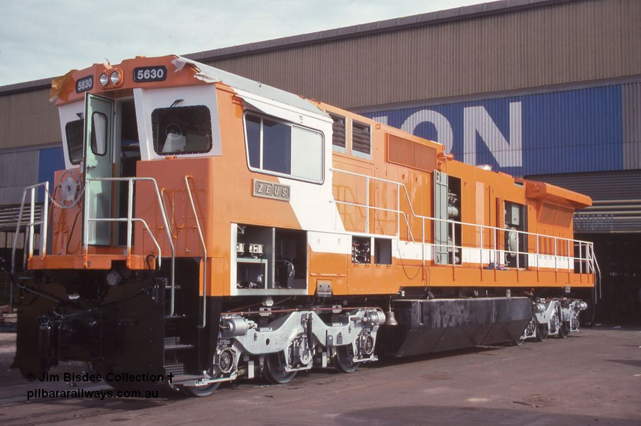 6997 001 Welshpool 19880819
Welshpool, Goninan workshops, under construction Mt Newman Mining's GE model CM39-8 loco 5630 'Zeus' serial 5831-09 / 88-079, 19th August 1988 image.
Jim Bisdee photo.
Keywords: 5630;Goninan;GE;CM39-8;5831-09/88-079;