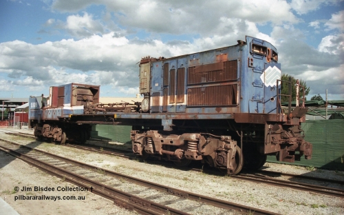 19795
Bassendean, Goninan workshops, former BHP Iron Ore Goninan GE rebuild C36-7M unit 5509, seen here stripped down to being an engine test bed, view from the no. 2 end. Sept 2003.
Jim Bisdee photo.
Keywords: 5509;Goninan;GE;C36-7M;4839-05/87-074;rebuild;AE-Goodwin;ALCo;C636;5452;G6012-1;