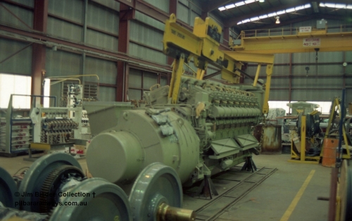 22661
Bassendean, during an Open Day at the Goninan workshops, a new GE-7FDL-16 prime-mover and GMG187 main alternator for install into a GE CM40-8M rebuild. 20th July 1991.
Jim Bisdee photo.

