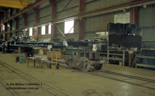 22669
Bassendean, during an Open Day at the Goninan workshops, a stripped back ALCo locomotive frame under re-construction which will become a GE CM40-8M. 20th July 1991.
Jim Bisdee photo.
Keywords: Goninan;GE;CM40-8M;