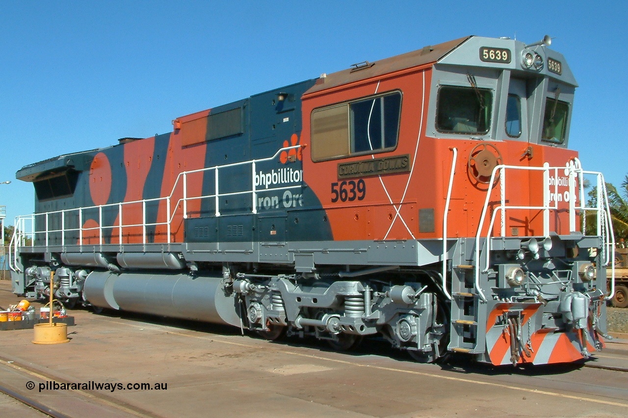 030720 160654r
Nelson Point Loco Service Shop, BHP Billiton Goninan GE rebuild CM40-8M 5639 'Corunna Downs' serial 8281-03 / 92-128 sits in the afternoon Pilbara sun displaying its brand new colours, painting only finished on it this day and about ten minutes after these photos where taken the unit was back in service! Sunday 20th July 2003.
Keywords: 5639;Goninan;GE;CM40-8M;8281-03/92-128;rebuild;AE-Goodwin;ALCo;C636;5459;G6027-3;