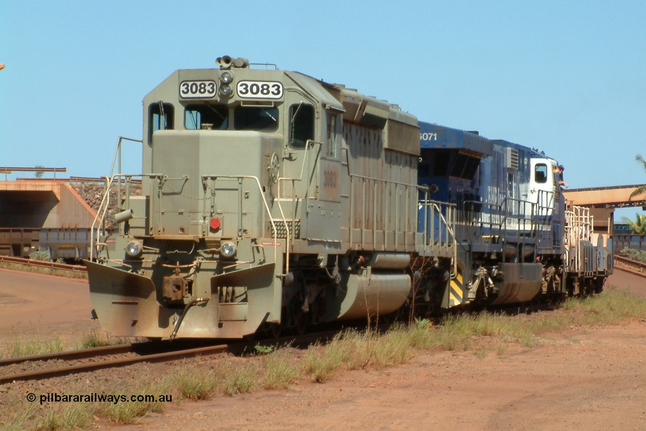 040403 103310r
Nelson Point, Car Dumper 3, BHP GE AC6000 6071 'Chichester' serial 51063 and SD40-2 unit 3083 serial 786170-2 originally Union Pacific UP 3500 push the empty rake towards the south yard in a method called the 'Pull-Push' style of spotting and clearing rakes 3rd April 2004.
Keywords: 3083;EMD;SD40-2;786170-2;UP3500;