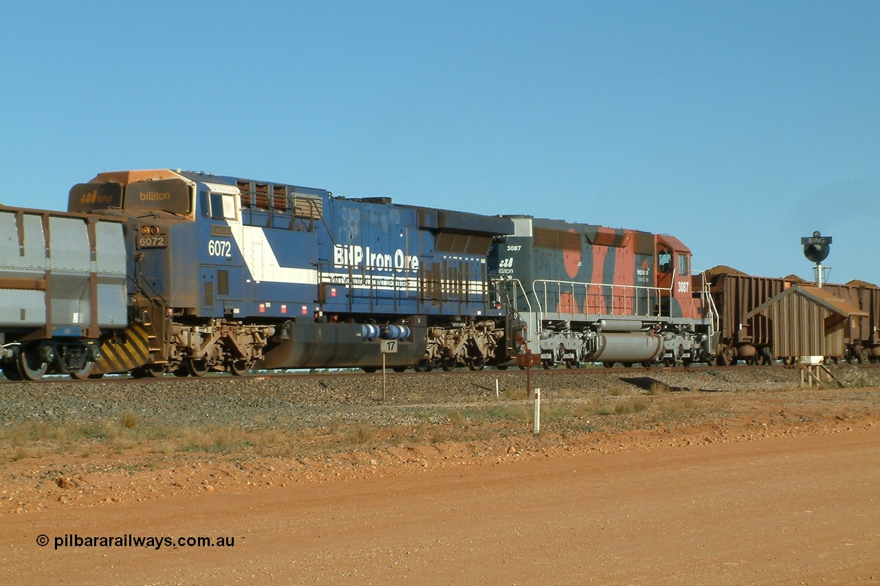 040802 155602r
Bing Siding, BHP mid train units GE AC6000 6072 'Hesta' serial 51064 with EMD SD40R 3087 serial 31519 formally Southern Pacific SD40 SP 8438. Note the windscreen protectors on 6072. 2nd August 2004.
Keywords: 6072;GE;AC6000;51064;