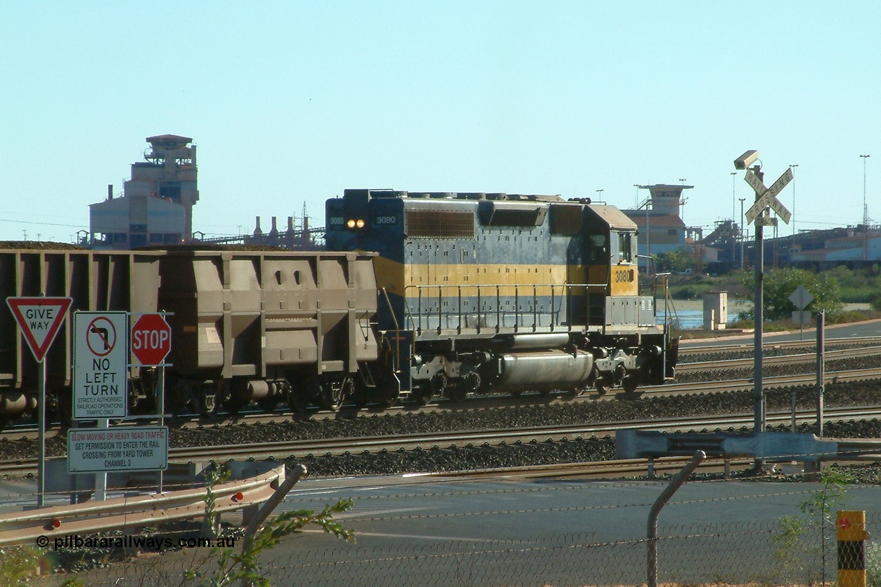 040809 161352r
Nelson Point BHP Billiton SD40 yard pilot unit 3080 serial 33674 originally Southern Pacific SD40 SP 8482 and wearing former owner IC&E blue and yellow livery crosses the BI-LO grade crossing with a loaded rake for Car Dumper 3 9th August 2004.
Keywords: 3080;EMD;SD40;33674/7083-4/SP8482;