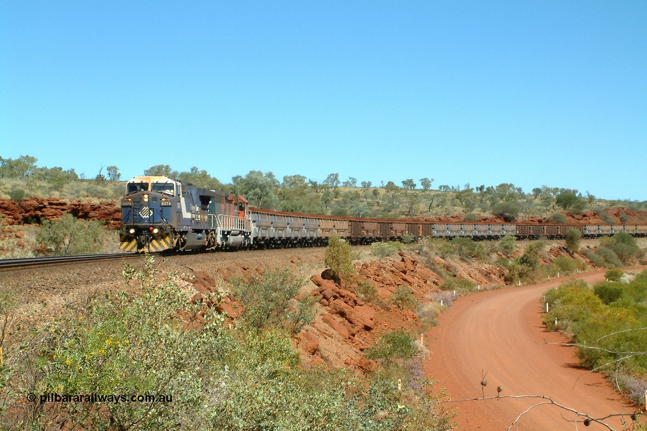 040810 125600r
Hesta Siding, BHP GE AC6000 6074 'Kalgan' serial 51066 leading EMD SD40R 3088 serial 31513 originally Southern Pacific SD40 SP 8432 with a loaded train powering upgrade 10th August 2004.
Keywords: 6074;GE;AC6000;51066;