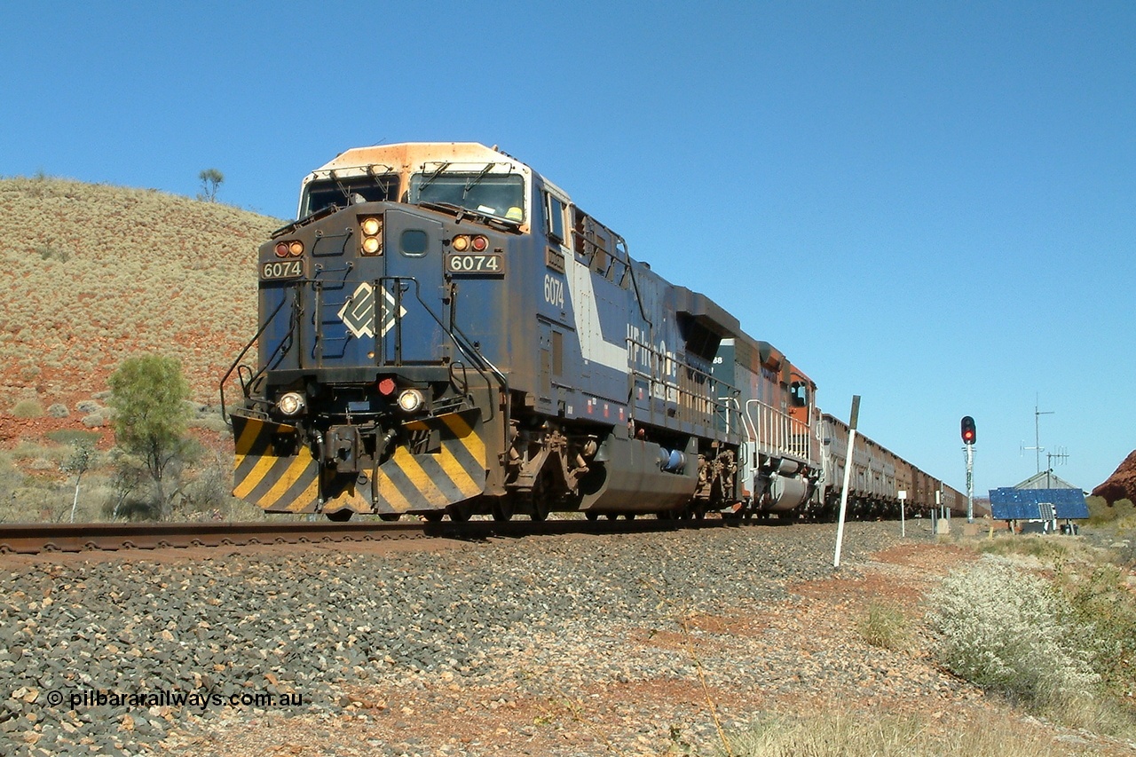 040810 130942r
The 226 km between Hesta and Shaw sidings, BHP GE AC6000 6074 'Kalgan' serial 51066 leading EMD SD40R 3088 serial 31513 originally Southern Pacific SD40 SP 8432 with a loaded train powering upgrade 10th August 2004.
Keywords: 6074;GE;AC6000;51066;
