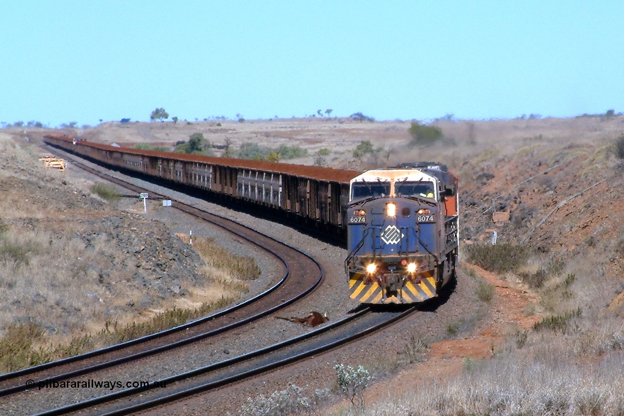 040810 133232r
Shaw Siding, BHP GE AC6000 6074 'Kalgan' serial 51066 leading EMD SD40R 3088 serial 31513 originally Southern Pacific SD40 SP 8432 with a loaded pass a victim of the cow plough 10th August 2004.
Keywords: 6074;GE;AC6000;51066;