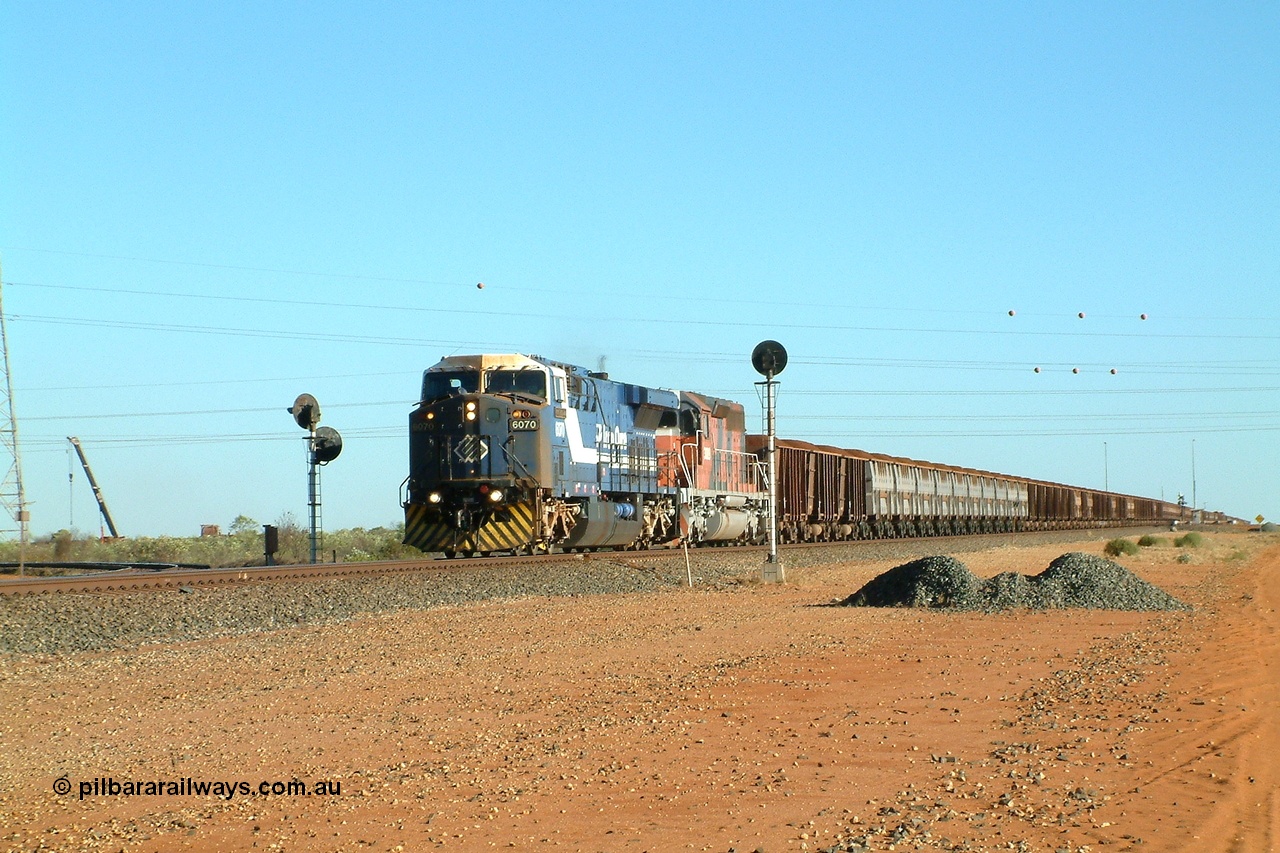 040811 161635r
Goldsworthy Junction, BHP GE AC6000 class leader 6070 'Port Hedland' serial 51062 runs through the junction leading EMD model SD40R unit 3089 serial 31512 formally Southern Pacific SD40 SP 8431 with a loaded Yandi train 11th August 2004.
Keywords: 6070;GE;AC6000;51062;