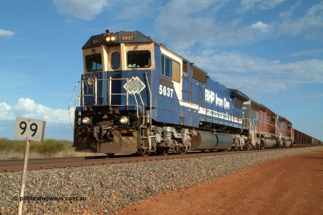 050101 170643r
Gillam Siding BHP Goninan GE rebuild CM40-8M 5637 'De Grey' serial 8181-01 / 92-123 leading a pair of EMD SD40R units 3087 and 3091 comes to a stand under the control of driver Jacka Cale behind another train already holding the main and an empty taking the passing track. Double crosses were not that uncommon during this era. 1st January 2005.
Keywords: 5637;Goninan;GE;CM40-8M;8181-01/92-123;rebuild;AE-Goodwin;ALCo;C636;5456;G6012-5;