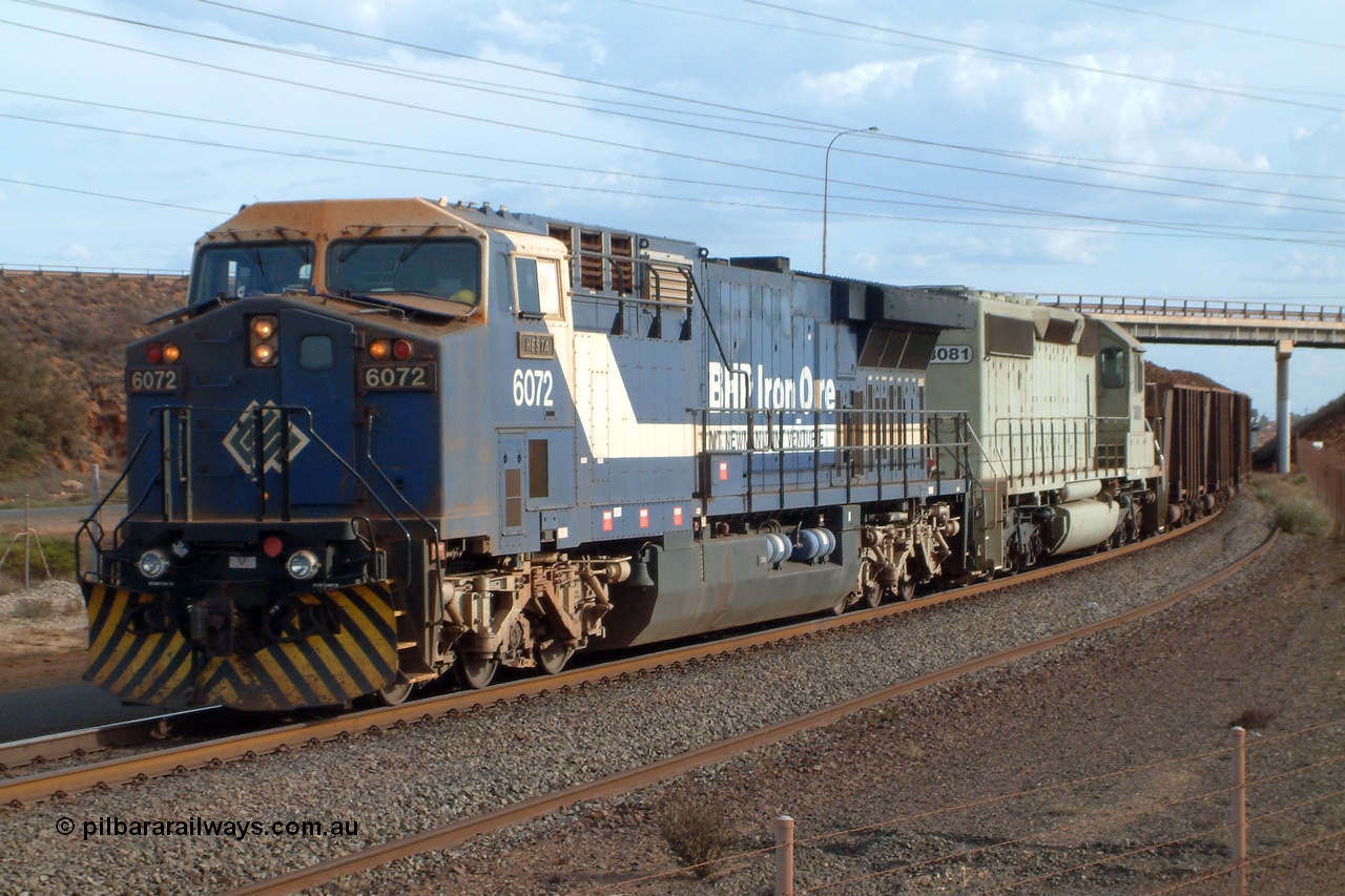 050102 170134r
Nelson Point, BHP GE AC6000 6072 'Hesta' serial 51064 leads EMD SD40-2 unit 3081 serial 786170-75 originally Union Pacific unit UP 3573 under the Redbank Bridge with their loaded train arriving into Nelson Point Yard 2nd January 2005.
Keywords: 6072;GE;AC6000;51064;