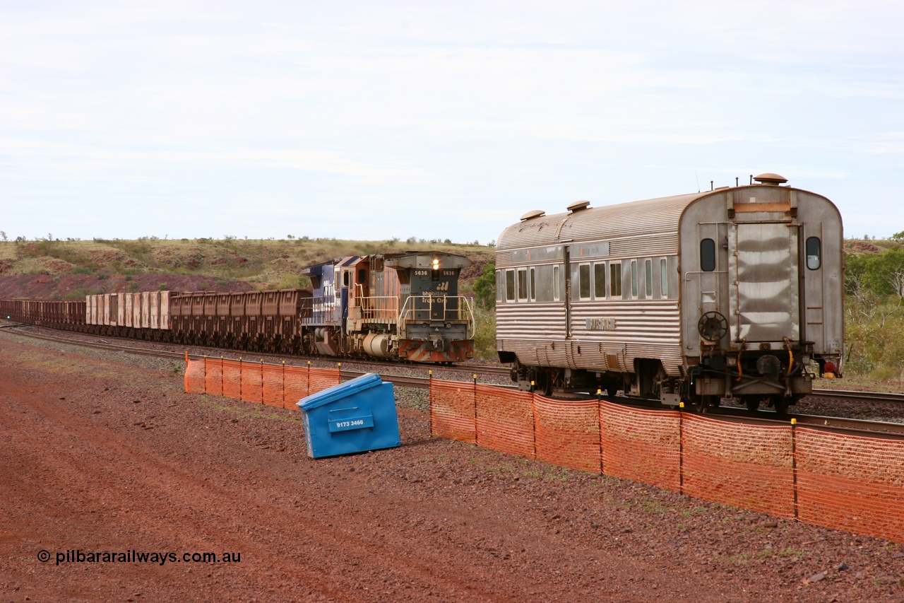 050624 3368
Goldsworthy Siding 110.8 km on the GML sees BHP Billiton Goninan GE rebuilt model CM40-8M unit 5636 'Munda' serial 8151-11 / 91-122 leading long end on a loaded Yarrie ore train assisting CM40-8 5646 past the Sundowner 24th June 2005. 
Keywords: 5636;Goninan;GE;CM40-8M;8151-11/91-122;rebuild;AE-Goodwin;ALCo;C636;5462;G6035-3;