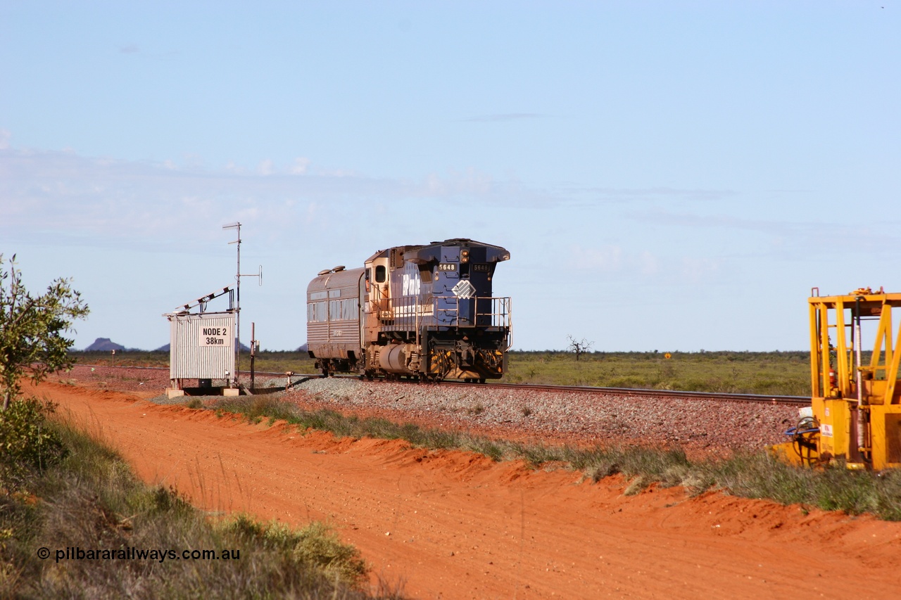 050625 3822
Node #2 at the 38 km on the GML sees BHP Goninan GE rebuilt model CM40-8M unit 5648 'Kwangyang Bay' serial 8412-06 / 93-139 long end leading the Sundowner along the main on its return to Hedland 25th June 2005.
Keywords: 5648;Goninan;GE;CM40-8M;8412-06/93-139;rebuild;AE-Goodwin;ALCo;M636C;5477;G6047-9;