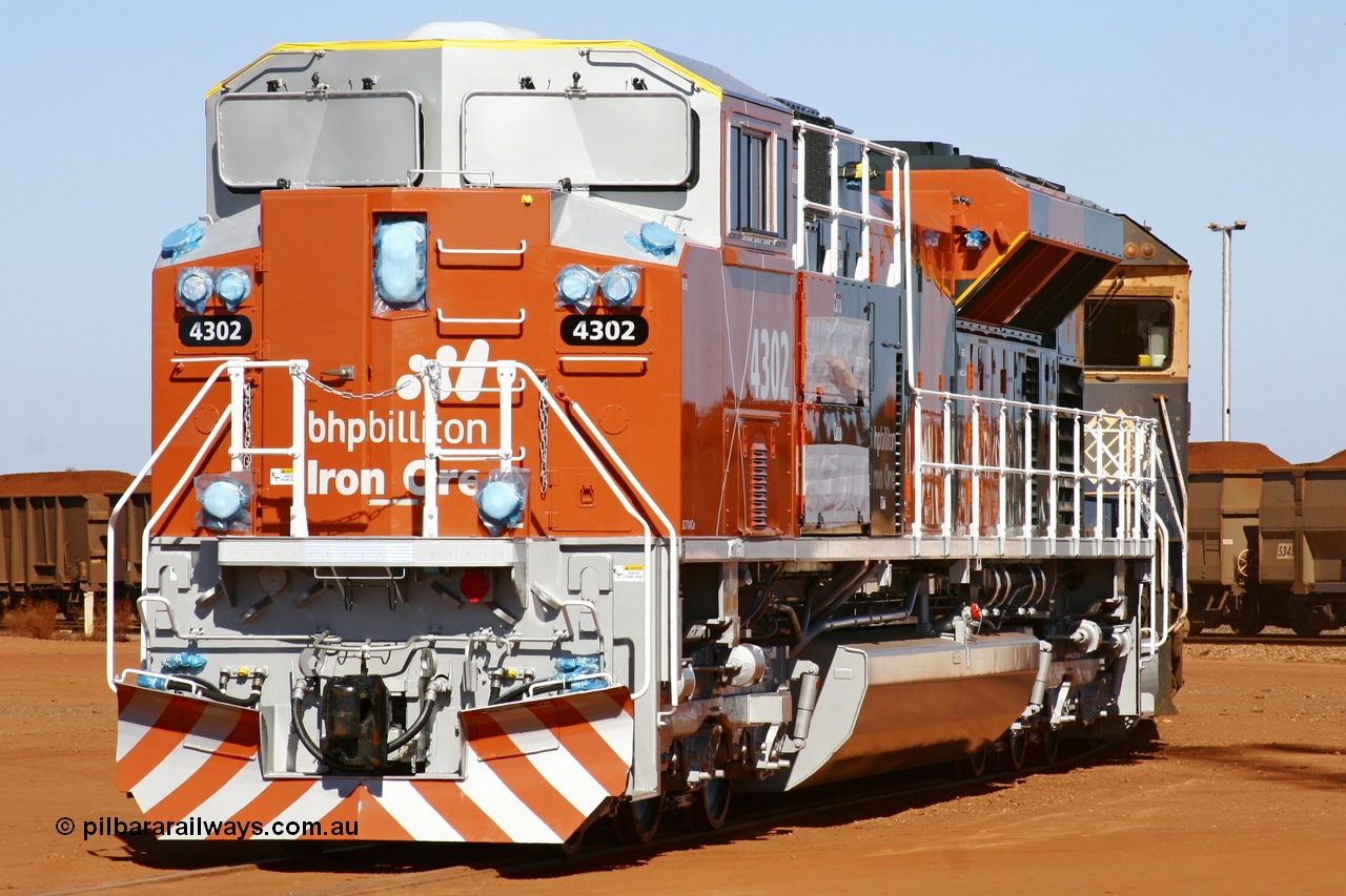 051022 6068r
Nelson Point hard stand area, the second BHP Billiton Electro-Motive built SD70ACe/LC unit to be unloaded off the Jumbo Vision was 4302 serial 20038540-003, seen being towed by 5667 to the service shop for fitting out by EDI, Electro-Motive's Australian agents. 22nd October 2005.
Keywords: 4302;Electro-Motive;EMD;SD70ACe/LC;20038540-003;