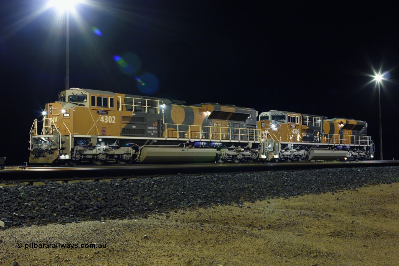 060301 3088r
Nelson Point yard sees BHP Billiton Electro-Motive built SD70ACe/LC units 4302 serial 20038540-003 and 4308 serial 20038540-009 awaiting their next call to duty on Wednesday night 1st March 2006.
Keywords: 4302;4309;Electro-Motive;EMD;SD70ACe/LC;20038540-003;20038540-009;