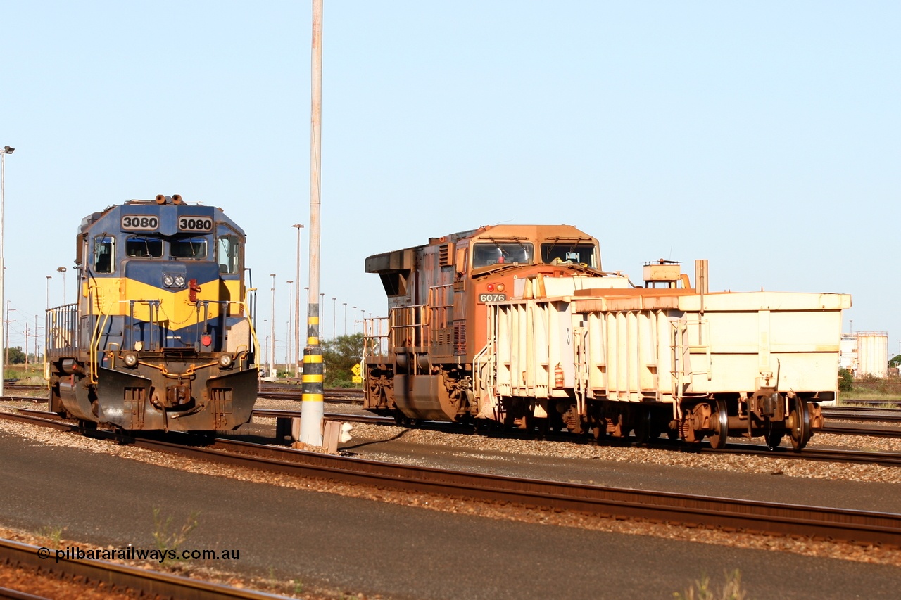 060414 3465r
Nelson Point, BHP Billiton yard pilot locos EMD SD40 3080 serial 33674 frame 7083-4 originally Southern Pacific SD40 SP 8482 and only 3000 hp shares the yard with GE AC6000 6076 'Mt Goldsworthy' serial 51068 and at 6000 hp is double 3080's size, between shunts 15th April 2006.
Keywords: 3080;EMD;SD40;33674/7083-4;SP8482;