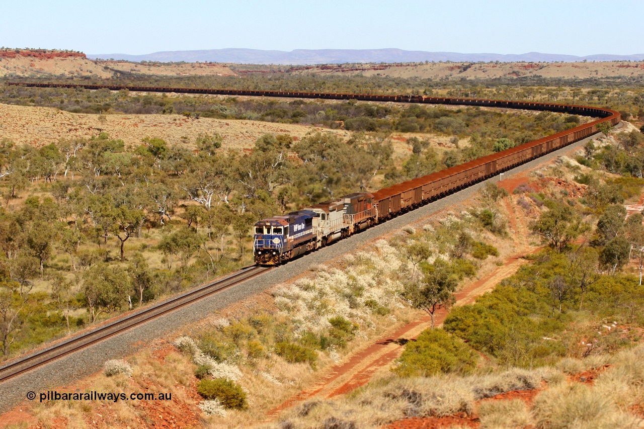 060714 6721r
Hesta, 226 km sees BHP Goninan GE rebuild CM40-8M 5657 'Fukuyama' serial 8412-02 / 94-148 with EMD SD40-2 3081 and SD40R 3089 as they struggle upgrade with a loaded Yandi train, mid-train remote units visible are a pair of EMD SD70ACe/LC locos 4302 and 4311 14th July 2006.
Keywords: 5657;Goninan;GE;CM40-8M;8412-02/94-148;rebuild;Comeng-NSW;ALCo;M636C;5492;C6084-8;