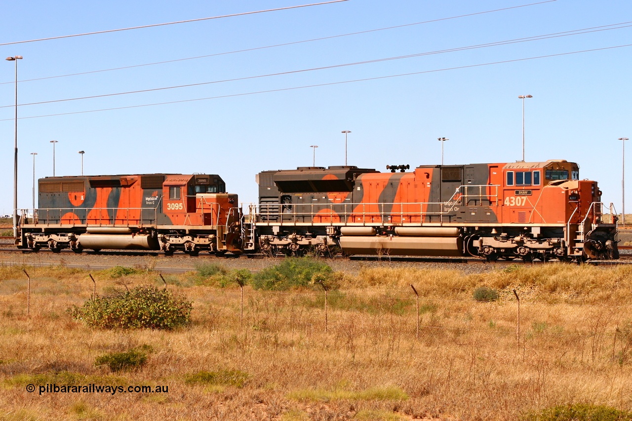 060719 7279r
Nelson Point, BHP Billiton examples of Electro-Motive built old and new motive power in the form of SD70ACe/LC unit 4307 'Shaw' serial 20038540-008 and SD40R unit 3095 serial 33677 / 7083-7. 19th July 2006.
Keywords: 4307;Electro-Motive;EMD;SD70ACe/LC;20038540-008;