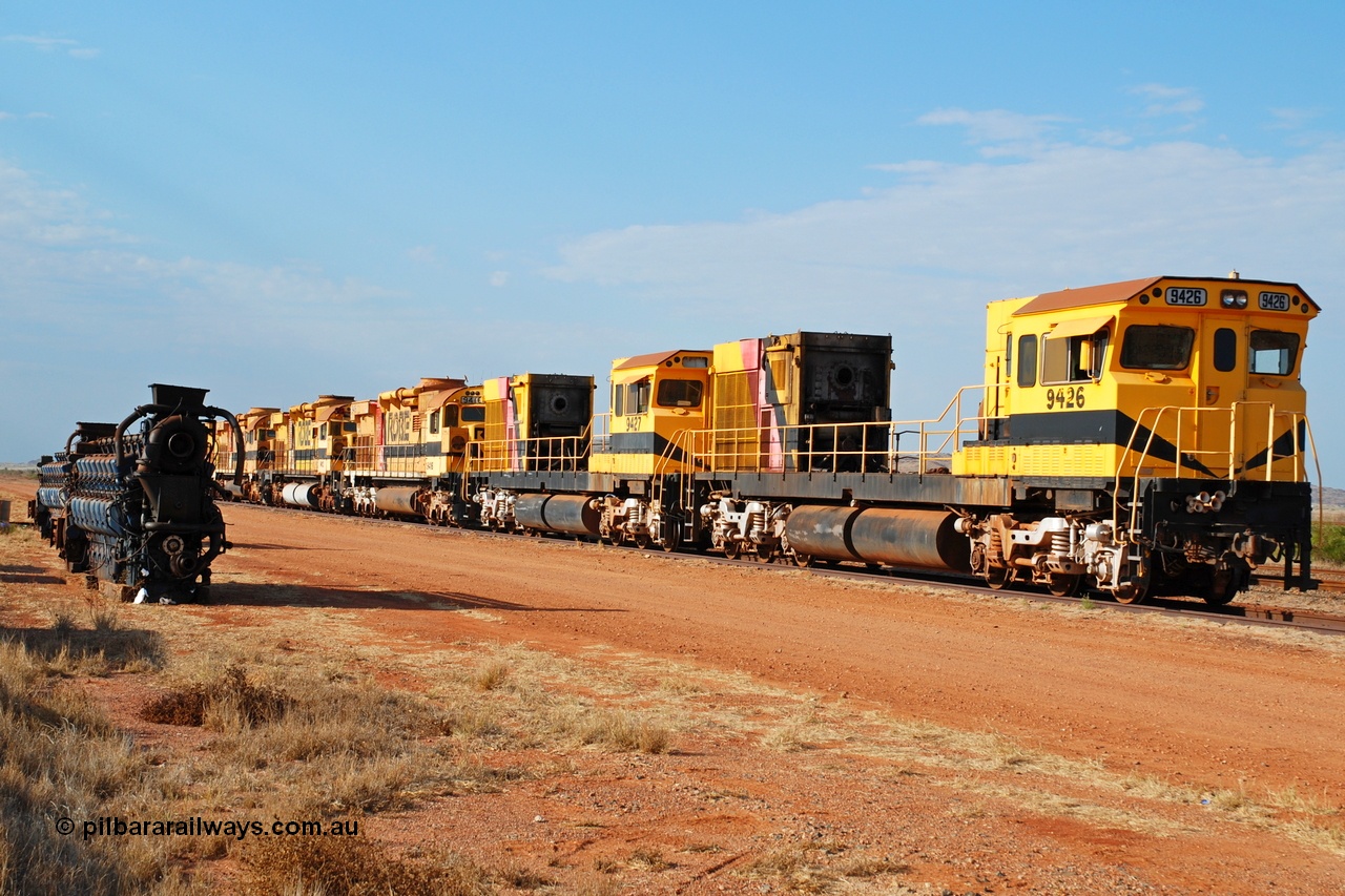 061026 0359r
Seven Mile, retired Robe River ALCo units in preparation to travel to Perth. Comeng WA ALCo rebuild C636R 9426 serial WA143-1 leads the all ALCo line up. 26th October 2006.
Geoffrey Higham image.
Keywords: 9426;Comeng-WA;C636R;WA143-1;rebuild;ALCo;Schenectady-NY;C636;Conrail;6782;3499-3;