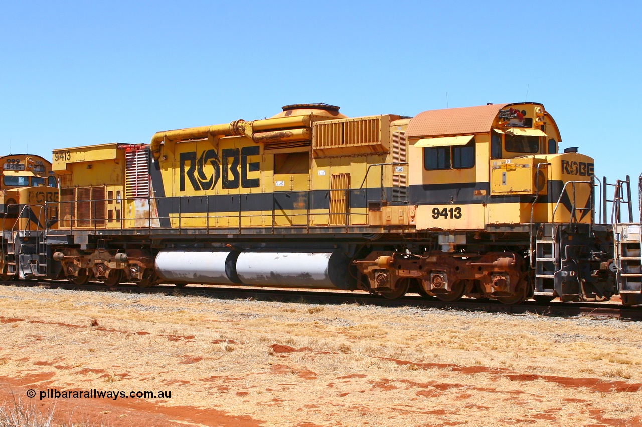 061209 8235r
Seven Mile 38 Road, former Robe River AE Goodwin built ALCo M636 unit 9413 serial G6060-4 from December 1971, originally numbered 262.004 during construction, then 1713 and finally 9413 awaits a new owner. The ducting on the hood is the air to air intercooler modifications. 9th of December 2006.
Keywords: 9413;AE-Goodwin;ALCo;M636;G6060-4;