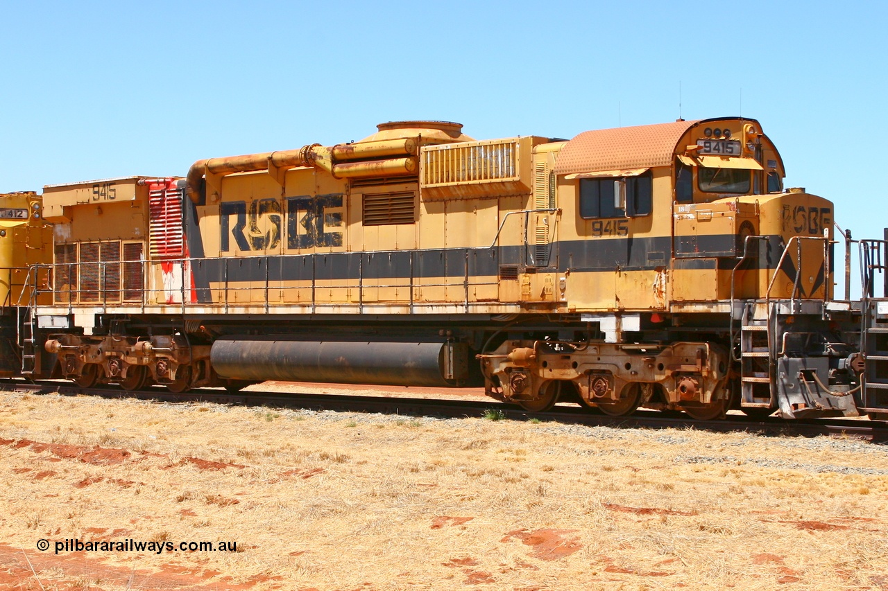 061209 8240r
Seven Mile 38 Road, former Robe River AE Goodwin built ALCo M636 unit 9415 serial G6060-6 from February 1972, the final unit in the original order, originally numbered 1715 then 9415 awaits a new owner. The ducting on the hood is the air to air intercooler modifications that Robe trialled. Also of note is the unit is fitted with an ALCo C630 fuel tank, swapped when the C630 units were rebuilt into the CM40-8M units. 9th of December 2006.
Keywords: 9415;AE-Goodwin;ALCo;M636;G6060-6;