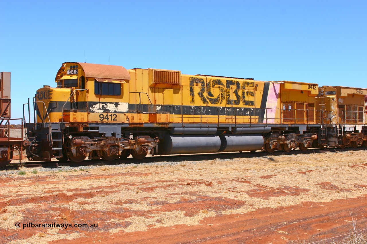 061209 8249r
Seven Mile 38 Road, former Robe River AE Goodwin built ALCo M636 unit 9412 serial G6060-3 from December 1971, originally numbered 262.003 during construction, then 1712 and finally 9412 awaits a new owner. 9th of December 2006.
Keywords: 9412;AE-Goodwin;ALCo;M636;G6060-3;