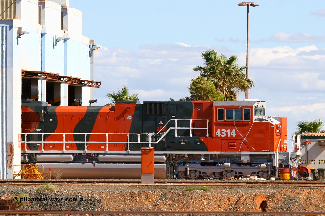 070402 8697
Nelson Point Locomotive Service Shop see brand new BHP Billiton's Electro-Motive built SD70ACe/LC unit 4314 serial 20058712-001, this first of a batch of ten to have the Electro-Motive 'Whisper' or isolated cab. BHP Billiton bought the first SD70ACe type locomotive with this feature, and as such this loco was sent for testing to the Pueblo Test Track in the USA prior to delivery. EDI personnel are fitting the unit out since arriving only the day before. 2nd April 2007.
Keywords: 4314;Electro-Motive;EMD;SD70ACe/LC;20058712-001;