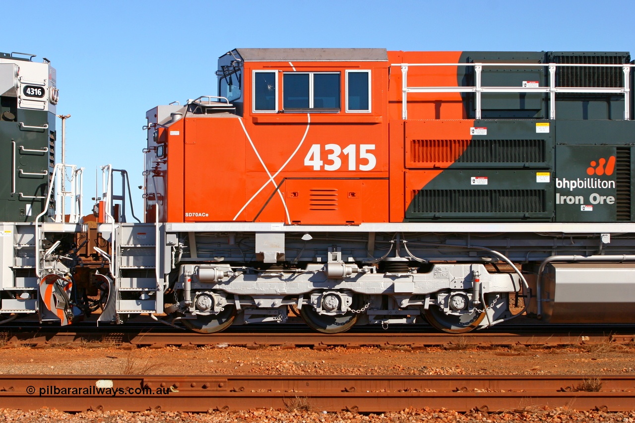 070415 8847
Nelson Point Locomotive Overhaul Workshop, left hand side view of BHP Billiton Electro-Motive built SD70ACe/LC unit 4315 serial 20058712-002 with isolated cab. BHP bought the first SD70ACe type locomotives with this feature and as such loco 4314 was sent for testing at the Pueblo Test Track in the USA. 14th April 2007.
Keywords: 4315;Electro-Motive;EMD;SD70ACe/LC;20058712-002;