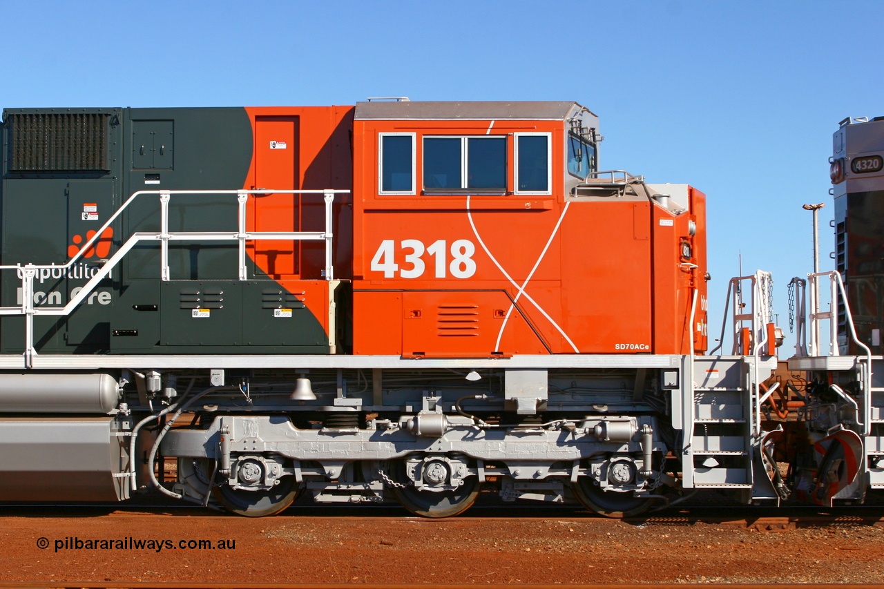 070415 8861
Nelson Point Locomotive Overhaul Workshop, right hand side view of BHP Billiton Electro-Motive built SD70ACe/LC loco 4318 serial 20058712-005 with isolated cab. Of note is the vertical sand filler on the nose compared to the original order, 15th April 2007.
Keywords: 4318;Electro-Motive;EMD;SD70ACe/LC;20058712-005;