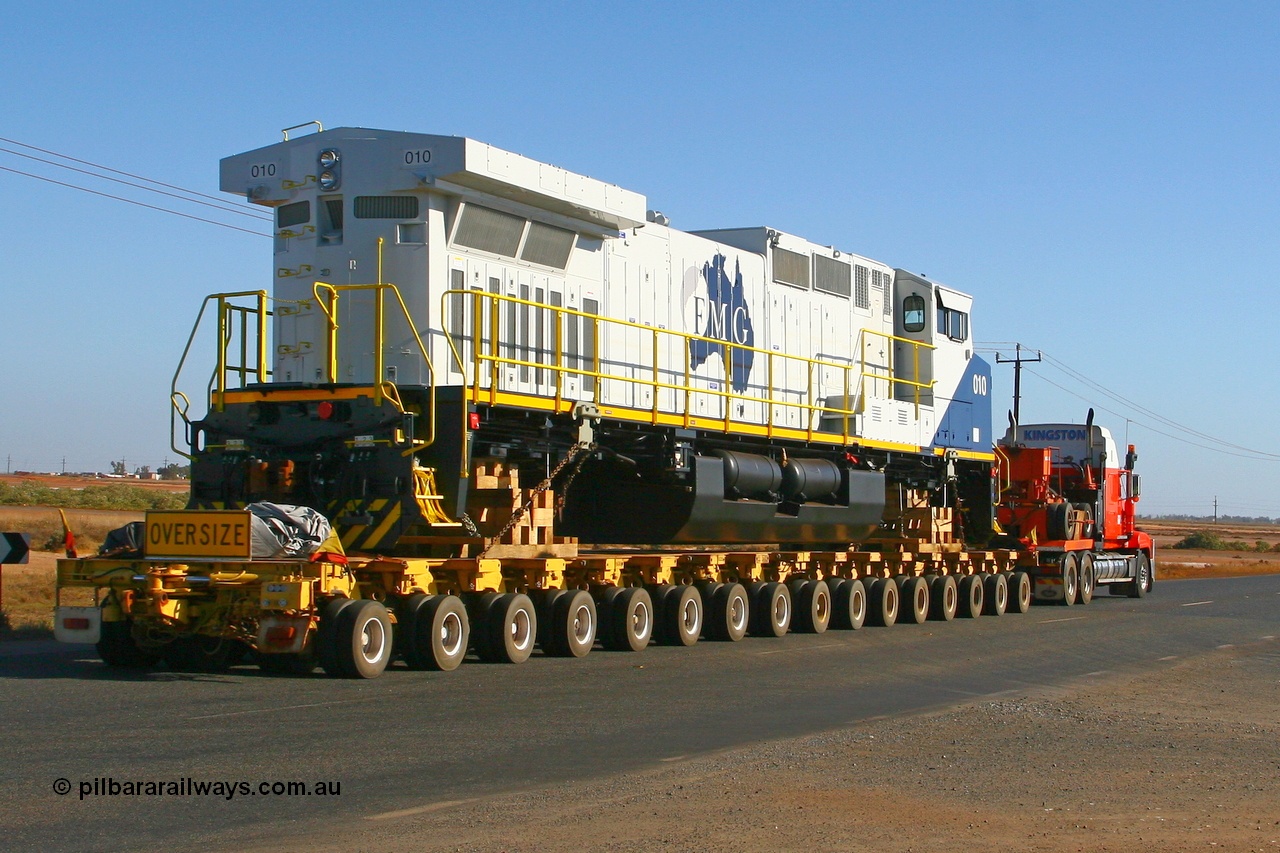 071101 1135r
Redbank Bridge, this view shows just how close an FMG General Electric built Dash 9-44CW 010 serial 58187 is to sister units of Pilbara Rail Dash 9-44CW in the way of cooling vents etc. Thursday 1st November 2007.
Keywords: FMG-010;GE;Dash-9-44CW;58187;