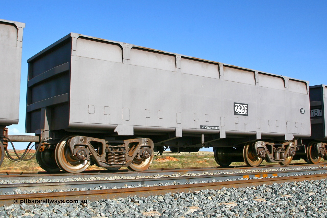 080116 1372r
Chapman Siding, FMG 'control' ore waggon 2396 tare 22.9 tonnes with bar coupling for the 'married' pair showing the train pipe, waggon control pipe and electrical jumper. Built by the Zhuzhou Rolling Stock Works in China, stands on the passing track. 16th January 2008.
Keywords: CSR-Zhuzhou-Rolling-Stock-Works-China;