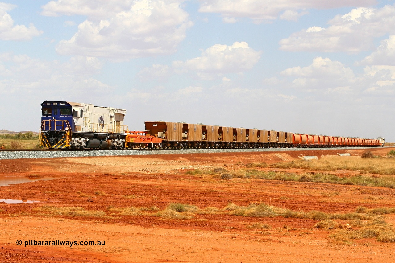 080120 1593r
Indee Road grade crossing, the afternoon ballast train makes its way south to the drop site having just crossed Indee Rd, 48.3 km. Comeng WA ALCo rebuild C636R loco DR 8404 'Vera' serial WA135 / C6040-01 with logos on the radiator, with DR 8403 on the lead. 20th January 2008.
Keywords: DR-class;DR8404;Comeng-WA;ALCo;C636R;WA135/C6040-1;