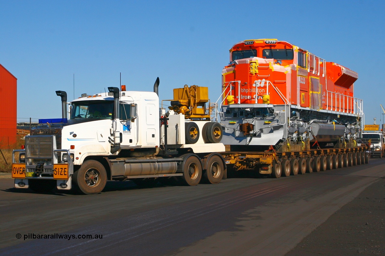 080614 2611
Port Hedland, Gilbert Street, brand new BHP Billiton Electro-Motive built SD70ACe 'Pumpkin' 4333 serial 20066862-062 is turning into Gate 9 and is the final unit in a ten unit order that was built originally for BNSF prior to BHP purchasing them. Thus proving an off the self US unit is suitable for Australia. Saturday 14th June 2008.
Keywords: 4333;Electro-Motive;EMD;SD70ACe;20066862-062;BNSF-9191;