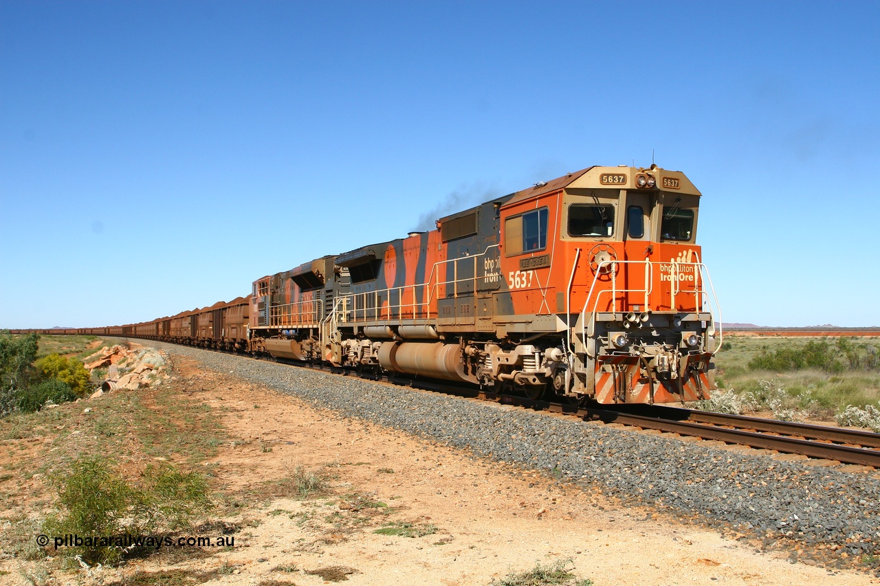 080621 2703r
Tabba Siding, BHP Billiton Goninan GE rebuild CM40-8M unit 5637 'De Grey' serial 8181-01 / 92-123 leads EMD SD70ACe/LC unit 4312 'Mindy' serial 20038540-013 with a loaded train from Mount Whaleback with the FMG line visible on the right 21st June 2008.
Keywords: 5637;Goninan;GE;CM40-8M;8181-01/92-123;rebuild;AE-Goodwin;ALCo;C636;5456;G6012-5;